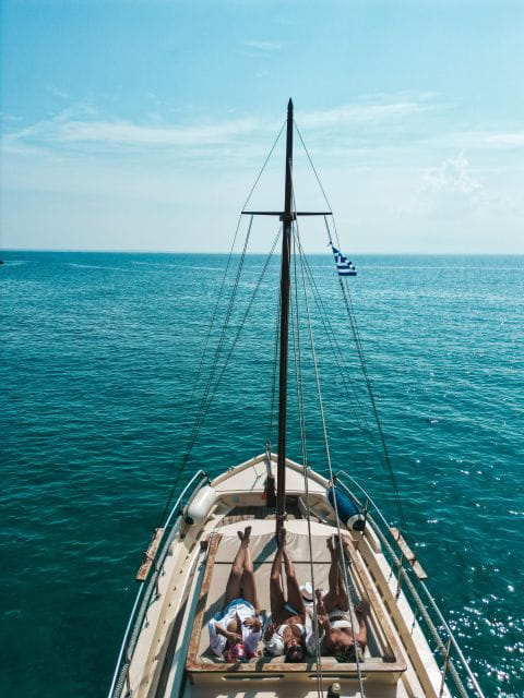 Mykonos: Private Cruise by Wooden Boat With Snorkeling - Snorkeling and Swimming