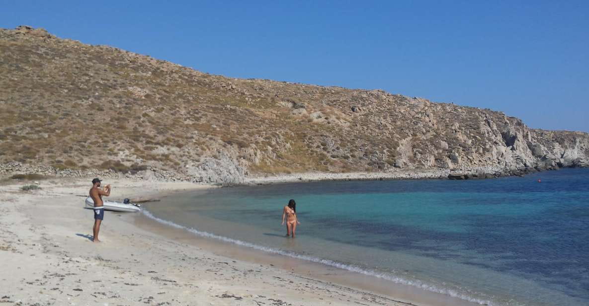 Mykonos: South Beaches & Rhenia Yacht Cruise With Transfers - Key Points
