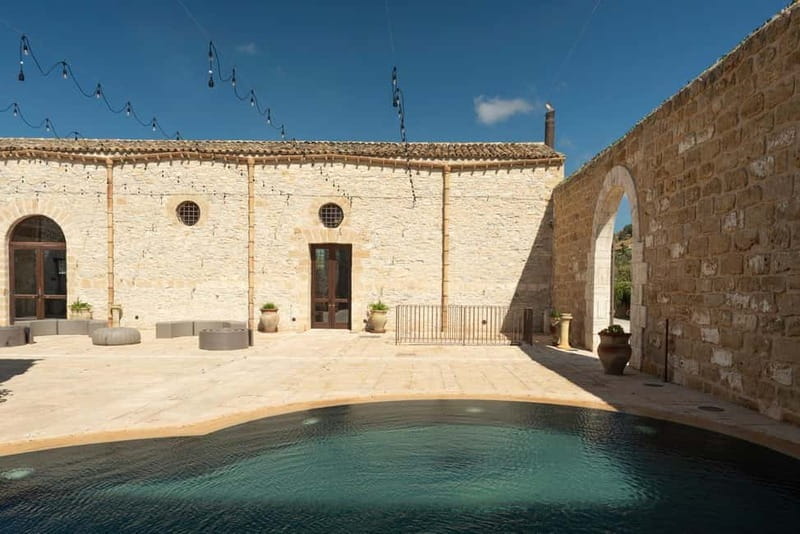 Nature and relaxation by the pool at Baglio Passofondo Estates - Key Points / Takeaways