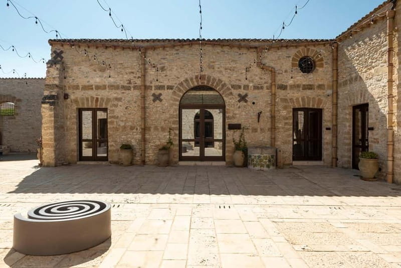 Nature and relaxation by the pool at Baglio Passofondo Estates - A Detailed Look at the Experience