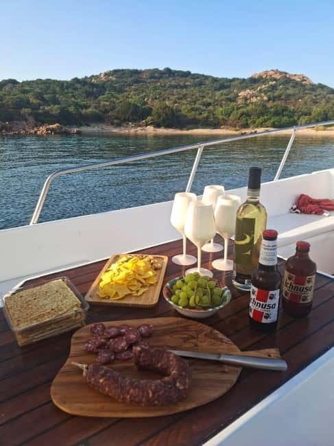 Olbia: Sunset aperitif on a boat - Discovering the Charm of a Traditional Sardinian Gozzo