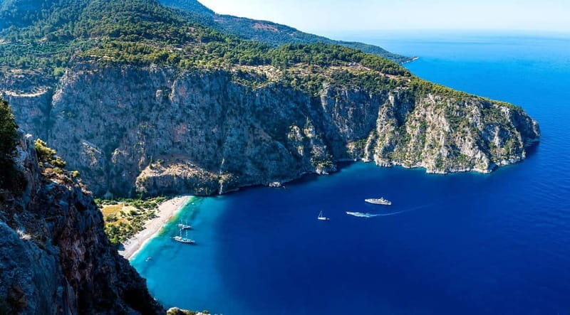Ölüdeniz: Blue Cave, Butterfly Valley & Lunch Boat Tour - Discovering the Magic of the Blue Cave and Butterfly Valley