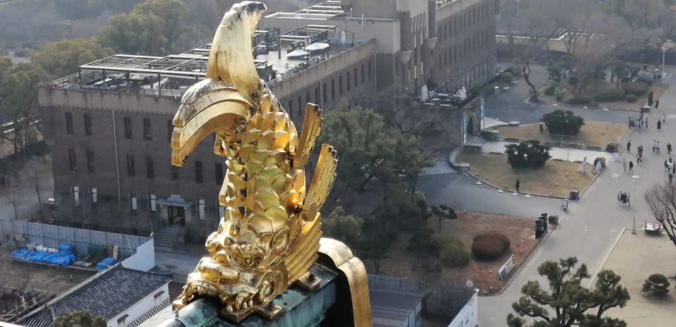 Osaka: Five Must-See Highlights Walking Tour & Ramen Lunch - Exploring Dotonbori District