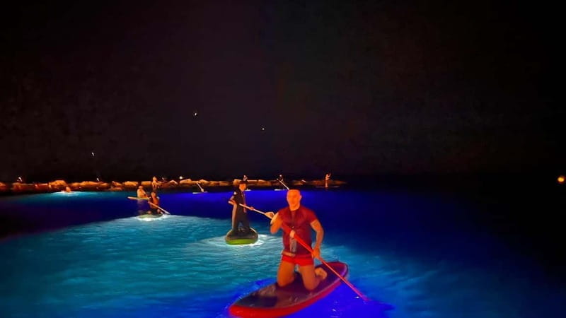 Paddle surf at night with light & drink -photos &videos - Why This Experience Is Worth It