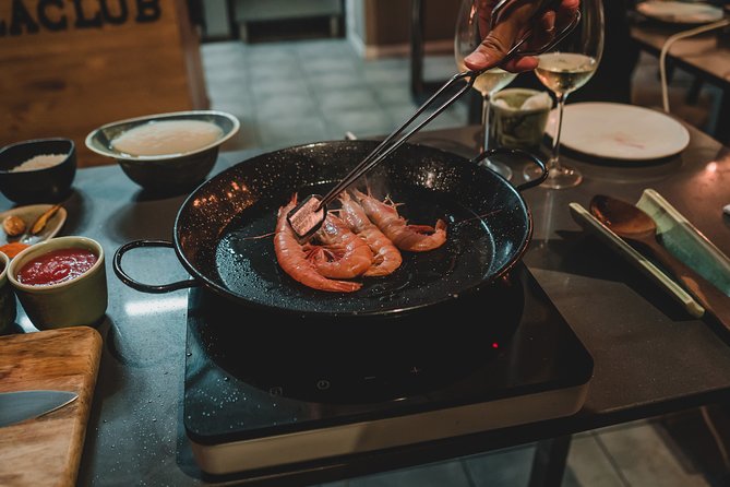 Paella Experience and Bottomless Wine in Barcelona - Paella Expertise
