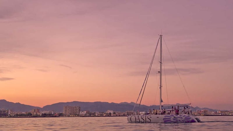 Palma de Mallorca: Deluxe Catamaran Sailing Tour with Meal - Sailing through Mallorca’s Bay and the Night Views