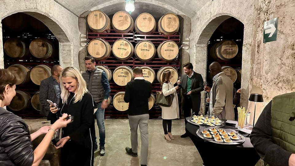 Palma: Distillery Tour With 6 Spirits and Tapas Tasting - Exploring the Distillerys Cellars