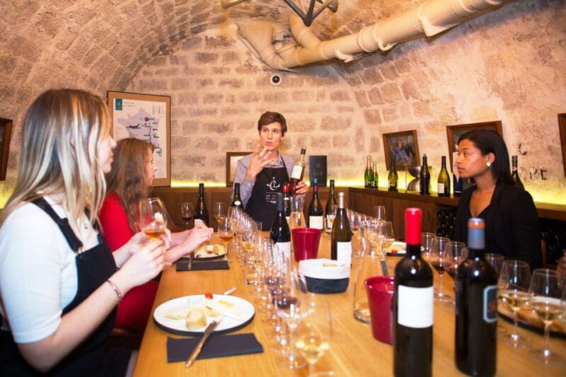 Paris: The Ultimate Wine and Cheese Tasting in English - Entering a Historic Parisian Cellar