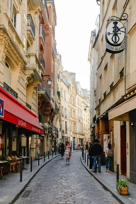 Paris: Welcome to Paris Group Walking Tour - Walking Through Parisian Neighborhoods: Charm and Character