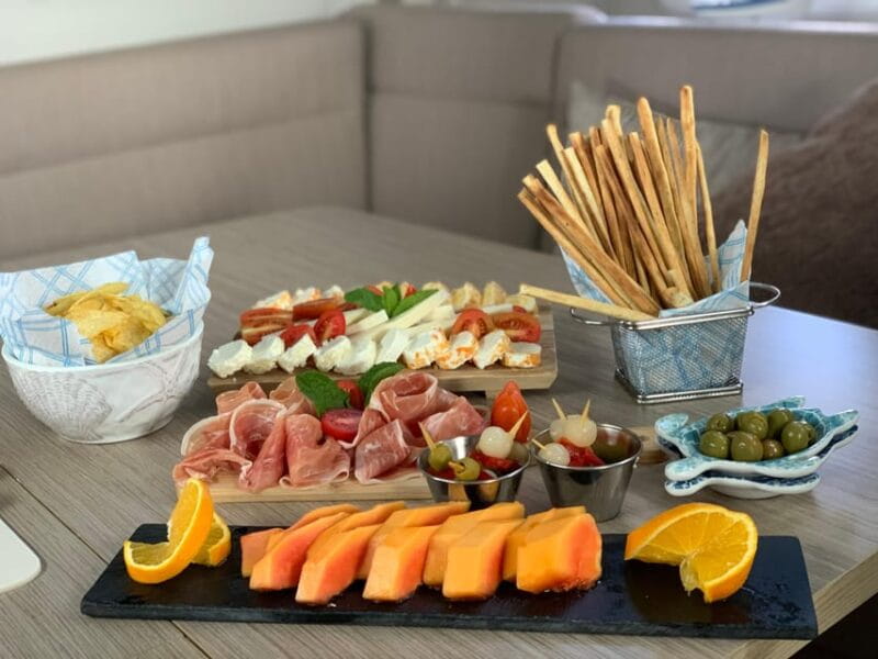 Pasito Blanco : Private sailing tour with food & drinks - Approaching the Bay: Sunbathing, Swimming, and Snorkeling