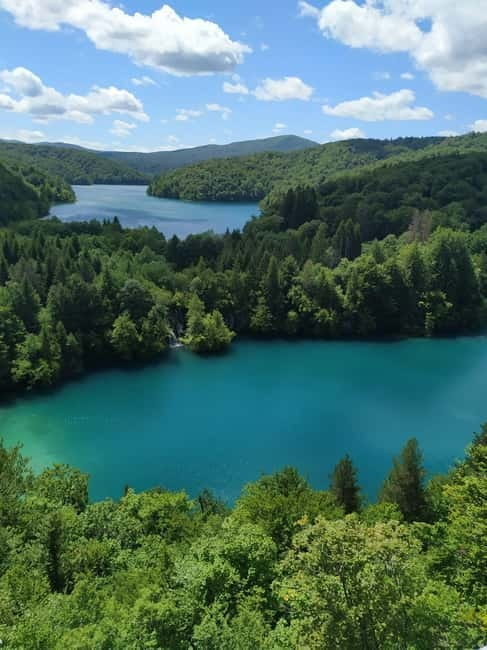 Plitvice Lakes: Guided Walking Tour with Train and Boat Ride - The Transport Experience: Panoramic Train and Boat Ride