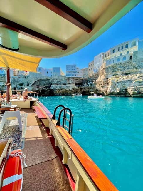 Polignano Monopoli: boat tour on a traditional wooden boat at sunset - The Charm of a Traditional Wooden Boat Tour