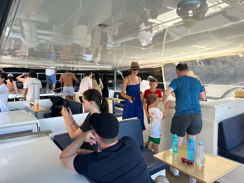 Portimão: Benagil Caves & Golden Coast Eco Catamaran Tour - Boarding the Eco-Friendly Catamaran