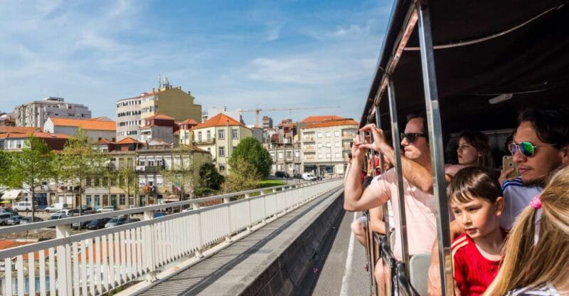 Porto: City Train Tour, River Cruise & Wine Cellar - Touring Portos Landmarks by Train