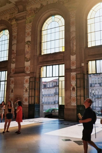 Porto: Historic Highlights Guided Walking Tour - Walking Through Porto’s Lively Streets and Historic Markets