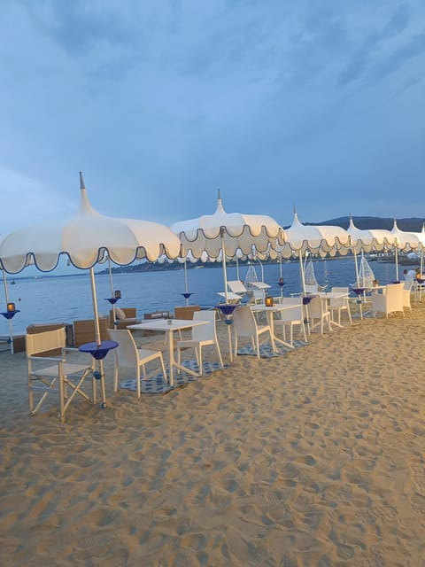 Porto Santo Stefano: La Caletta beach club - Cocktails under the umbrella - Key Points / Takeaways