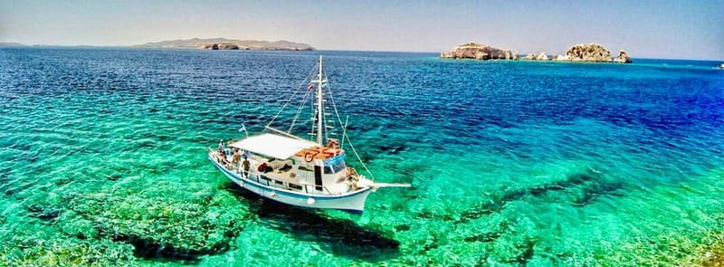 Pounta: Blue Lagoon Boat Tour - The Final Destination: Fira Antiparos or San Spiridon