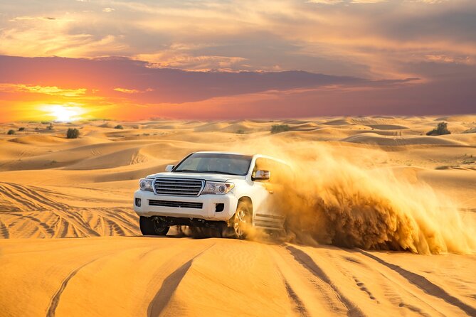 Premium Desert Safari With Live BBQ Dinner and Camel Ride Tour - Adventurous Dune Driving Experience