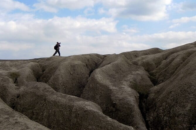 Private Bucharest Muddy Volcanoes and Unirea Salt Mine Tour - Exploring the Unirea Salt Mine: Europes Largest Salt Chamber
