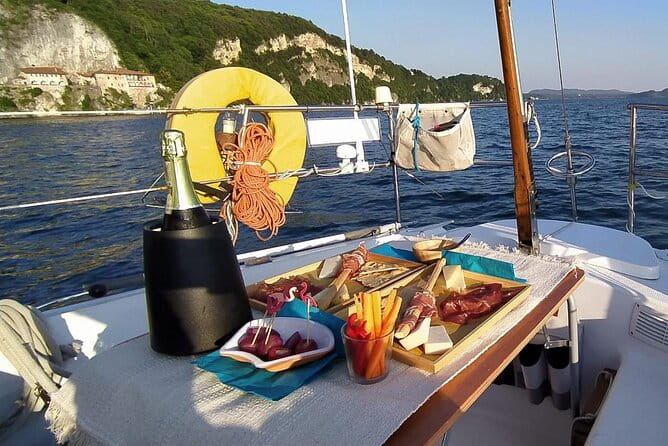 Private Tour on a Sailing Boat on Lake Maggiore with Aperitif and Music - Sailing on Lake Maggiore: Setting the Scene