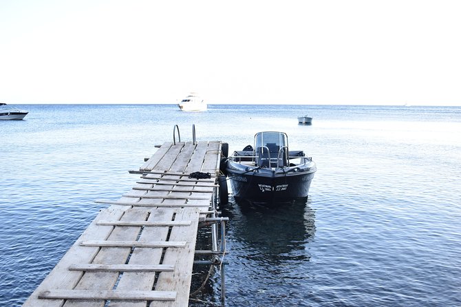 Rent a Boat in Santorini Without a License - Cancellation and Weather Policy Details