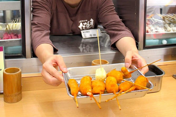 Retro Osaka Street Food Tour: Shinsekai - Visiting the Food Stops