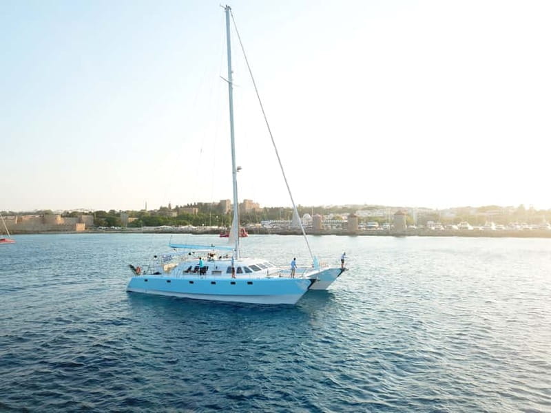 Rhodes: Catamaran Cruise with Snacks, Wine & Sunset Viewing - Entering the World of Rhodes’ Coastal Charm