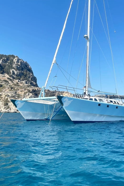 Rhodes: Catamaran Cruise with Snacks, Wine & Sunset Viewing - Who Should Consider This Experience?