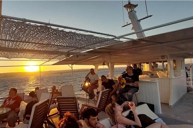 Rhodes Sunset Cruise - Swim and Dine w/ Live Music & Sunset! - Key Points