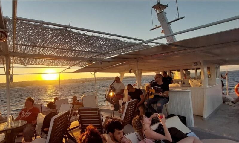 Rhodes: Sunset Cruise with Live Music, Wine & Greek Buffet - Key Points / Takeaways