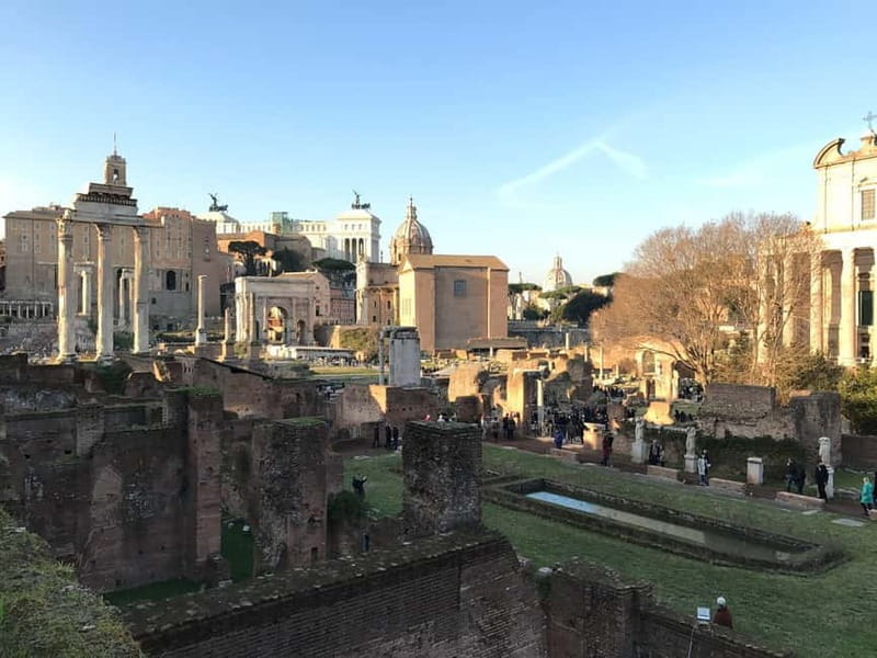 Rome: Colosseum, Forum Audio Tour with Hop-on Hop-off Bus - The Hop-on Hop-off Bus: A Quick Scenic Overview