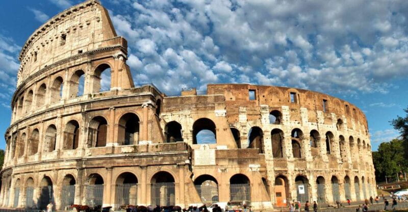 Rome: Combo Colosseum and Vatican Group Tour - Entering The Colosseum: A Step Back in Time