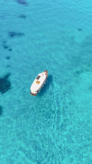 San Teodoro: Fishing trip and lunch with fresh catch and diving among the islands - Exploring Tavolara: History, Trekking, and Royal Secrets