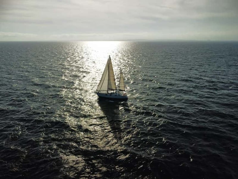 Santa Pola: Sailboat trips to Tabarca, snorkeling, and sunset with tasting - Watching the Sunset and Returning to Santa Pola