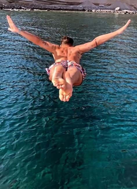 Santorini: Adventurous Catamaran Experience with Snorkeling - Exploring the Itinerary in Detail