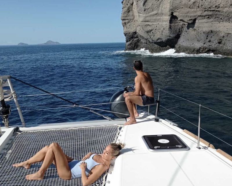 Santorini: Catamaran Cruise With Lunch, Drinks, & Oia Visit - Oia Guided Tour and Safety Briefing