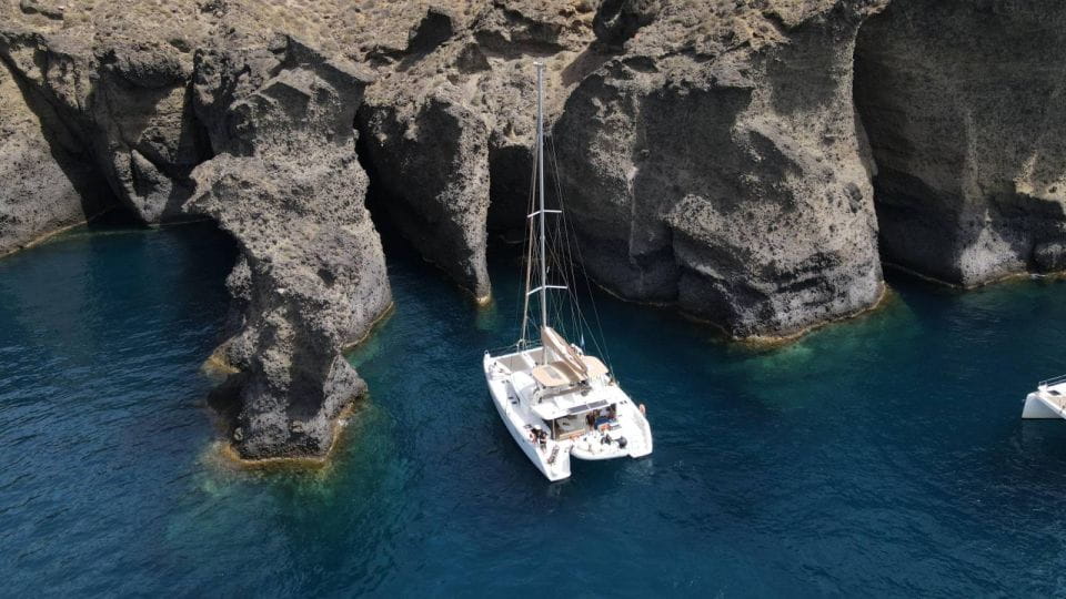 Santorini Catamaran Day Cruise: Lunch, Drinks and Transfers - Booking Information