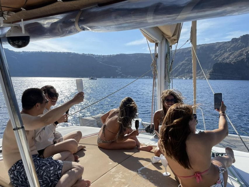 Santorini Catamaran Day Cruise: Lunch, Drinks and Transfers - Hotel Pickup and Drop-off