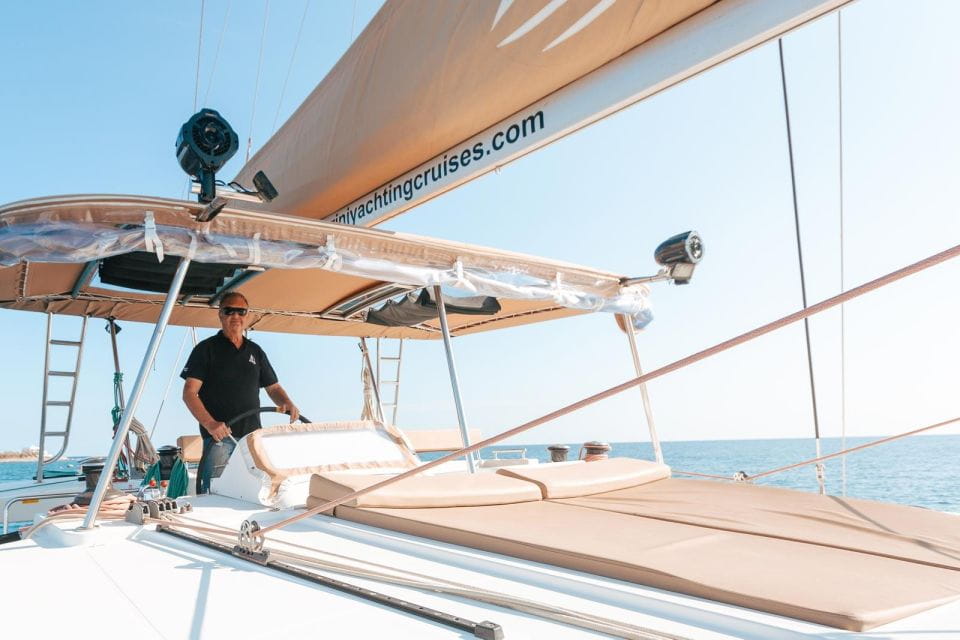 Santorini Catamaran Day Cruise: Lunch, Drinks and Transfers - Traditional Greek Lunch and Drinks