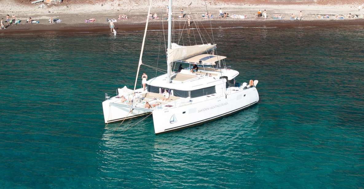 Santorini Catamaran Day Cruise: Lunch, Drinks and Transfers - Relaxation on the Catamaran