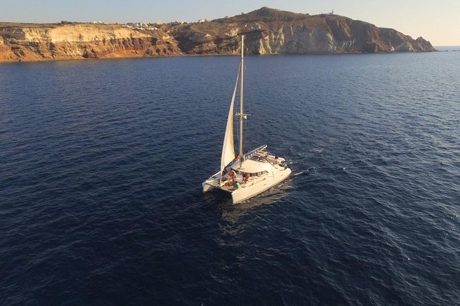 Santorini Full Day Catamaran Private Cruise Incl. Meal, Drinks & Free Transport - COVID-19 Protocols