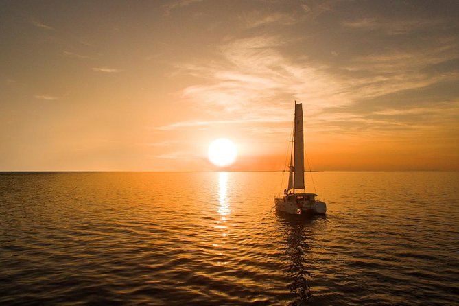 Santorini Luxury Catamaran Sunset Cruise With Bbq, Drink and Transfer - Included Beverages and Meal