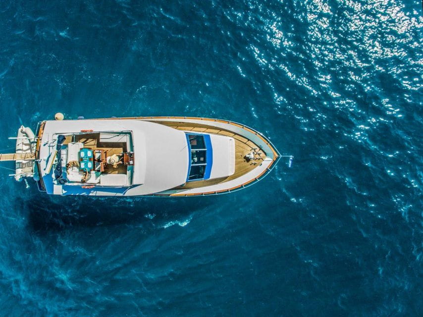 Santorini: Motor Yacht Day Cruise With 5-Course Lunch - Frequently Asked Questions