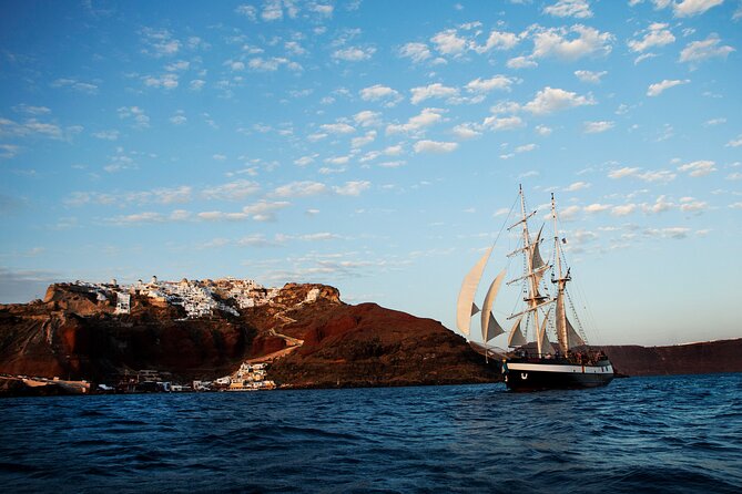 Santorini Sunset Dinner Cruise Including Nea Kameni Visit - Relaxing in the Hot Springs