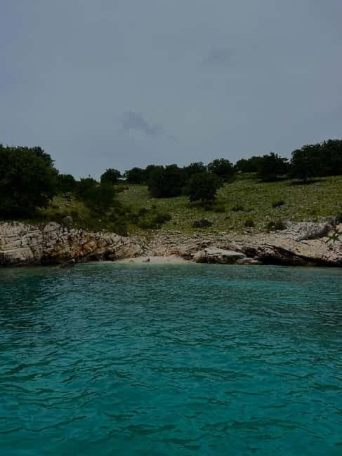 Sarandë Boat Tour with Free Beach Umbrella Access - Key points / Takeaways