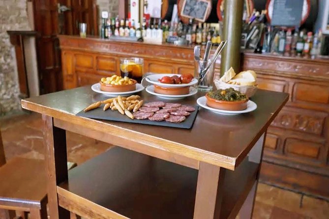 Sevilla Food Tour: Tapas, Wine, History & Traditions - Discovering Sevilles History and Traditions