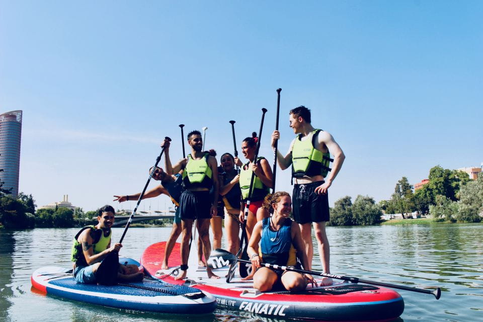 Seville: Group Giant Paddle-Boarding Session - Booking and Cancellation Policy