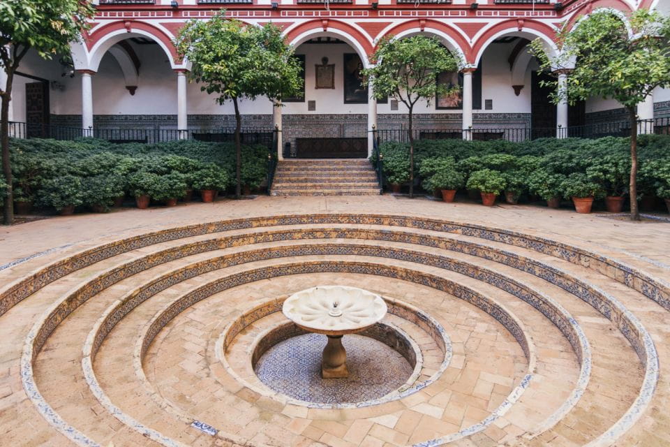 Seville: Los Venerables Ticket With Audio Guide - Booking and Cancellation Policy