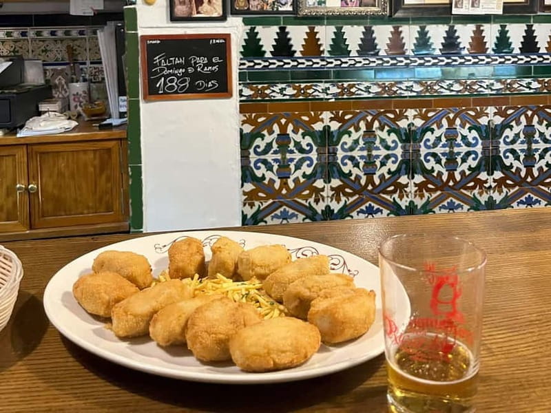 Seville: Secret Food Tour with Tapas and Drinks - Entering Sevillian Food Culture: A Closer Look at Each Stop