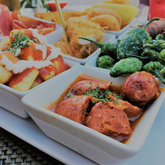 Seville: Tapas and Flamenco Experience - Traditional Sevillian Cuisine